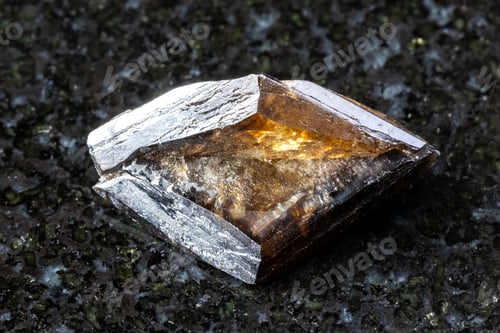 Preview: sample of rough twinned titanite crystal on black