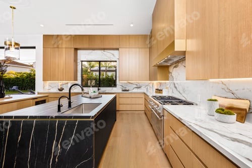 Preview: Modern kitchen with wooden cabinets and marble countertops.