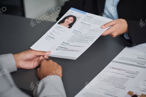 Preview: Woman giving her documents to get visa