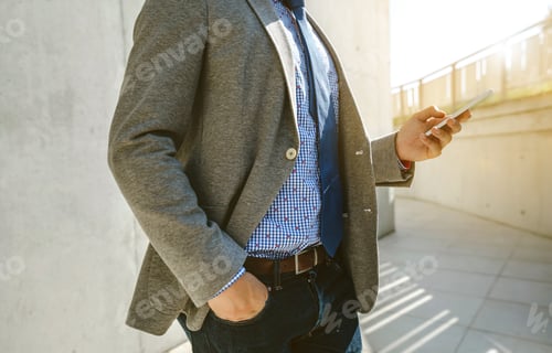 Preview: Businessman with cell phone