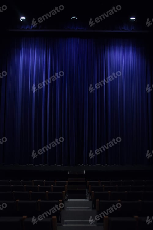 Preview: Closed empty theater with blue curtains