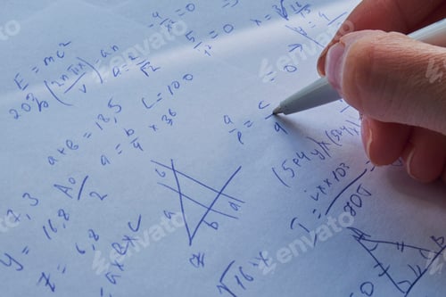 Preview: sheet of paper filled with calculations as a background.