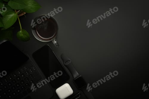 Preview: Blank modern workspace with smart phone, coffee cup, smartwatch and earphones.