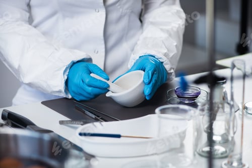 Preview: Food safety inspector working in laboratory