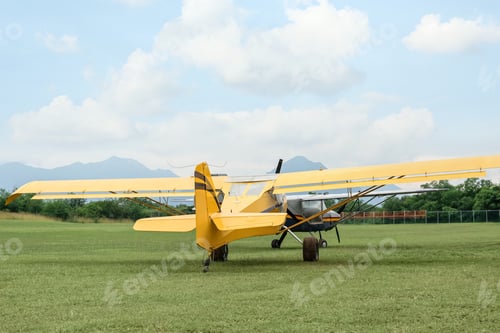 Preview: View of beautiful ultralight airplanes in field on autumn day