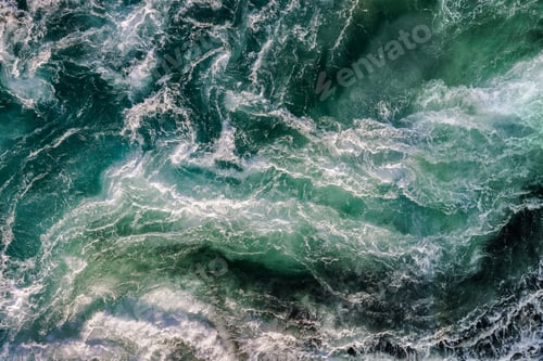 Preview: Blue waves of water of the river and the sea meet each other during high tide and low tide.