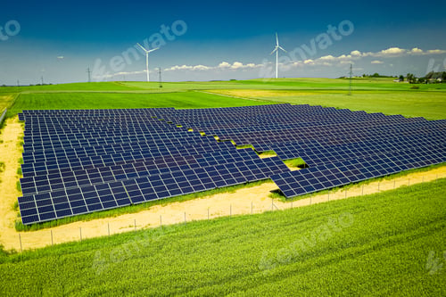 Preview: Amazing view of solar panels and wind turbines in summer