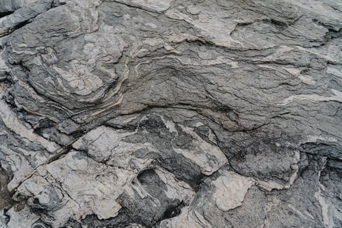 Preview: Gray rock natural surface used as background texture and wallpaper.