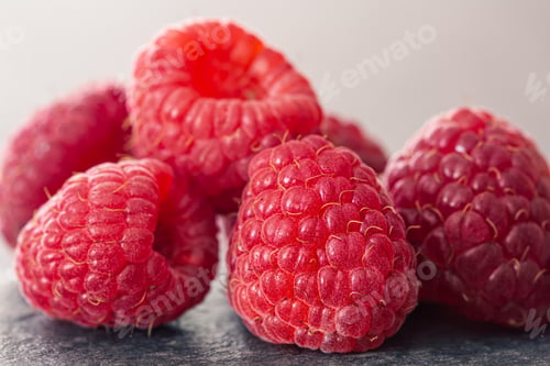 Preview: Ripe raspberries macro shot, selective focus, fruit background.