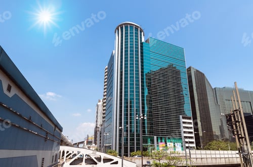 Preview: Modern business building glass area at downtown with sun