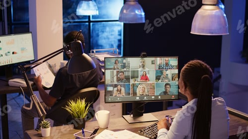 Preview: Project manager talking to people on business videoconference call