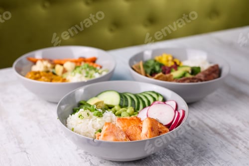 Preview: Bowls of food and a green velvet cloth on a table