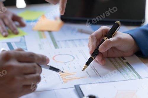 Preview: Group of business people meeting for business plan Analyze corporate growth graph and chart to plan