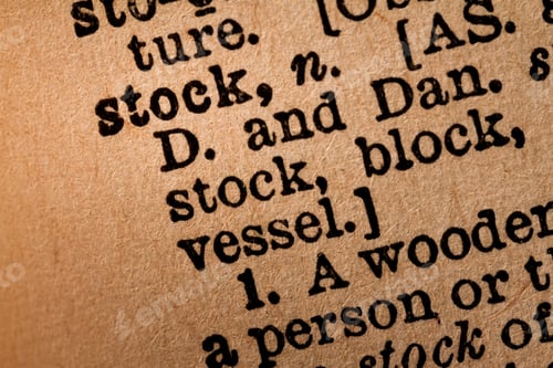 Preview: Close-up of an Opened Dictionary showing the Word STOCK