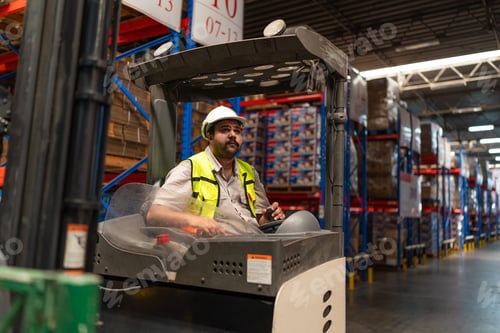 Preview: Warehouse worker driver in uniform delivery and loading pallet product.