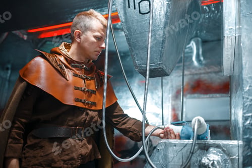 Preview: Space scientist holds an unusual instrument
