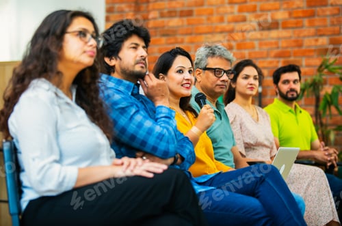 Preview: Indian Young business professionals gathering for corporate training session in professional office