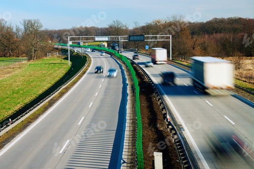 Preview: Traffic on motorway with motion blurred cars
