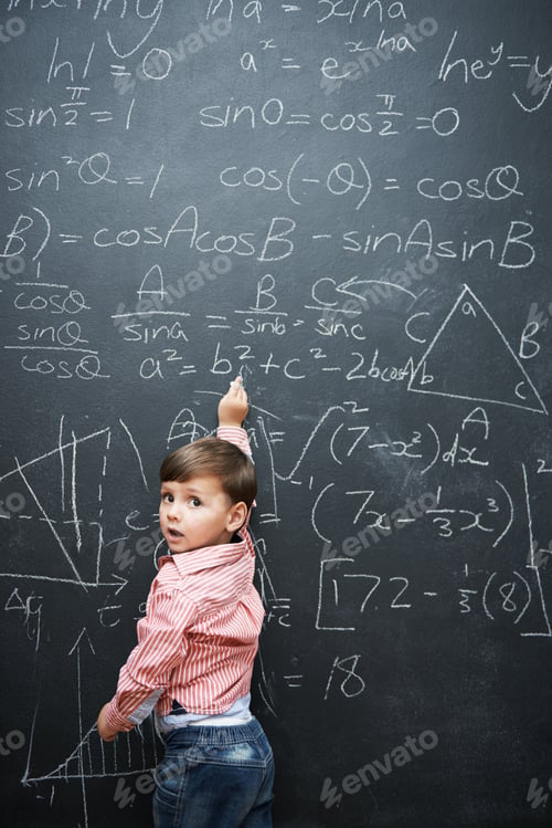 Preview: What a little genius. Studio shot of a young boy with a blackboard full of math equations.