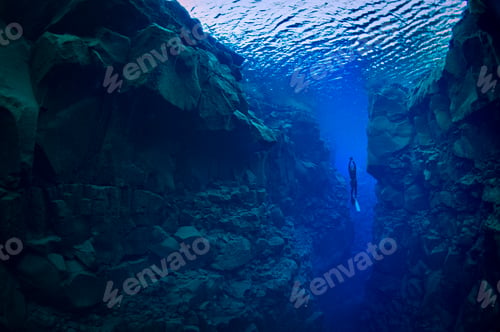 Preview: A lone diver explores the serene underwater canyon