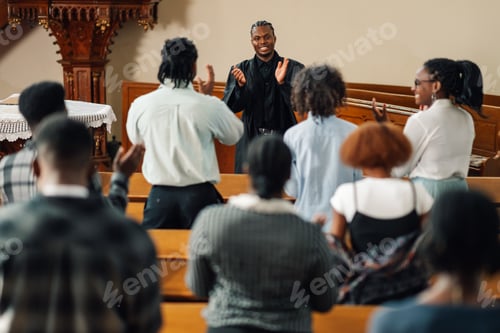 Preview: Congregation clapping while pastor is preaching in church