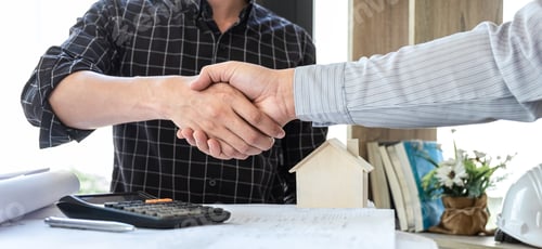 Preview: Successful Business Handshake Agreement Over Real Estate