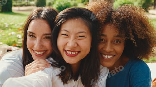 Preview: Girls look at the camera and laugh merrily and take selfie