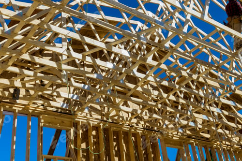 Preview: Aerial view of wood framework a new wooden house under construction
