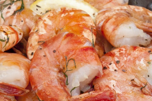 Preview: Cooking shrimp on a pan. Close up view.