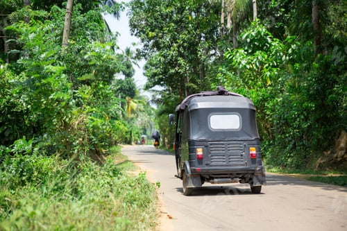 Preview: Tuk tuk on road of Sri Lanka, back view