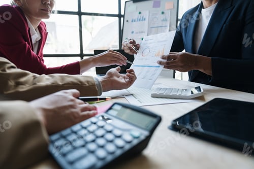 Preview: A group of Asian businessmen meet, plan and discuss data analysis, charts, graphs, financial calcula