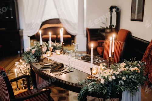 Preview: wedding table decoration with flowers on the table in the castle, table decor for dinner by