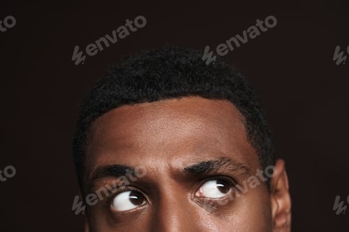 Preview: Young black man posing and looking aside