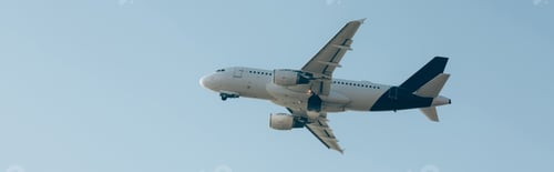 Preview: Flight departure of airplane in blue sky, panoramic shot