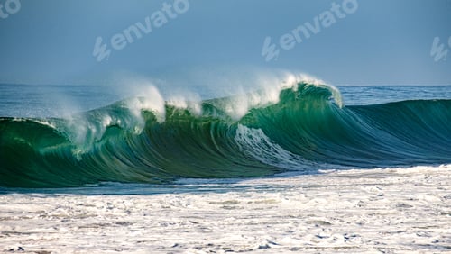 Preview: Zoomed in glassy green blue wave breaking with spray