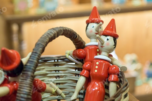 Preview: wooden boy Pinocchio from Carlo Collodi's fairy tale in the window in the souvenir shop in Rome