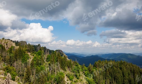 Preview: Mountain range of Rhodope Mountains covered with vegetation against the backdrop of valley