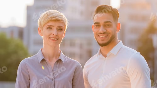 Preview: Portrait of diverse colleagues multiethnic co-workers caucasian business woman blonde short hair and