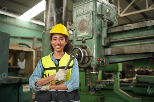 Preview: Female engineers working in industry factory.