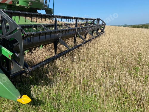 Preview: farmer on grain harvester
