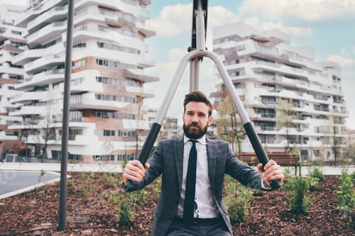 Preview: Young elegant professional executive business man outdoor sport park training steaming off tension