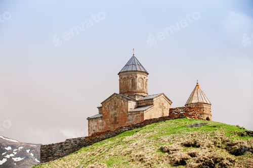 Preview: Stephantsminda, Georgia. Gergeti Trinity Church Or Tsminda Sameba - Holy Trinity Church Near Village