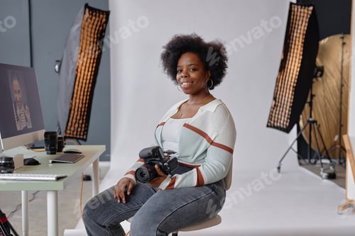 Preview: Female Photographer Smiling at Camera