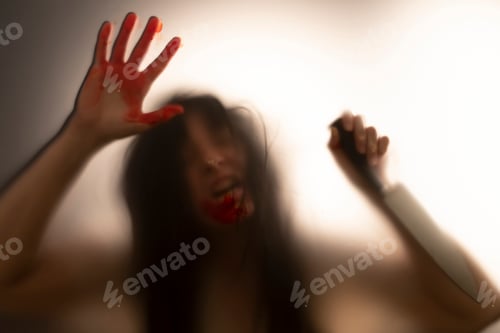 Preview: Woman killer with a knife in her hand. Creepy background