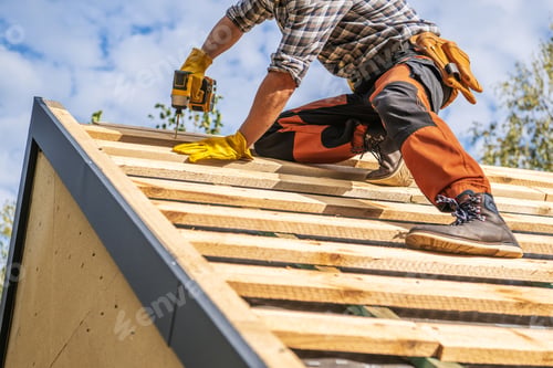 Preview: Roofing Contractor Attaching Wooden Elements to the House Roof
