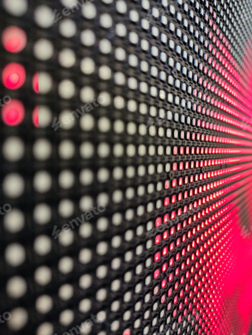 Preview: Background of colorful luminous circles with pattern, closeup of a led screen