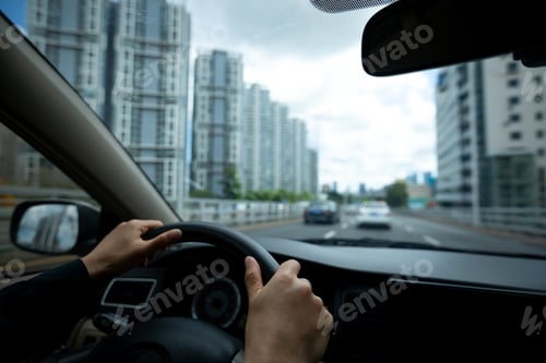 Preview: People driving car on city road