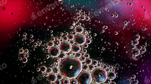 Preview: Abstract Colorful Food Oil Drops Bubbles and spheres Flowing on Water Surface
