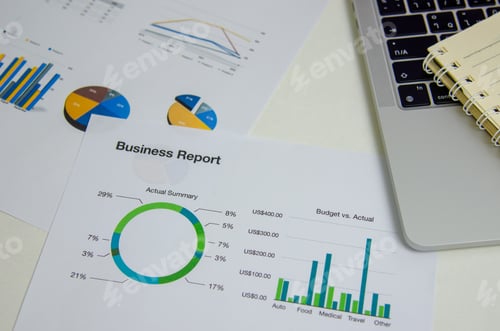 Vista previa: Top view document graph business finance investment marketing with computer laptop on desk.
