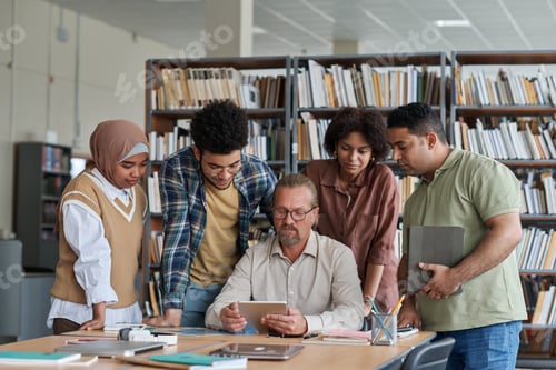 Preview: Teacher having lesson with migrant students
